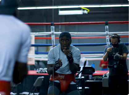 Filming a boxer's training session for 'Africans In Sports'.