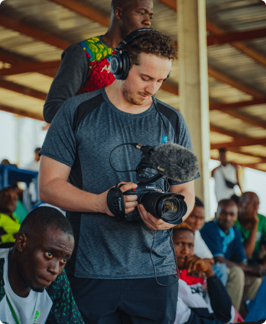 Jordan Scott Berns, founder of JSB Video, filming a sports documentary in Nigeria.